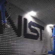 Photo of antenna lab with NIST logo in the background